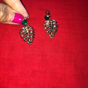 Gold tone earrings leaf 🍂 shape with green stone